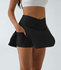 "Jupe-short de sport Noir avec short intégré, tissu fluide et taille haute, idéale pour le tennis ou le fitness