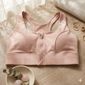 "Brassière orange avec fermeture éclair, design élégant et maintien optimal.